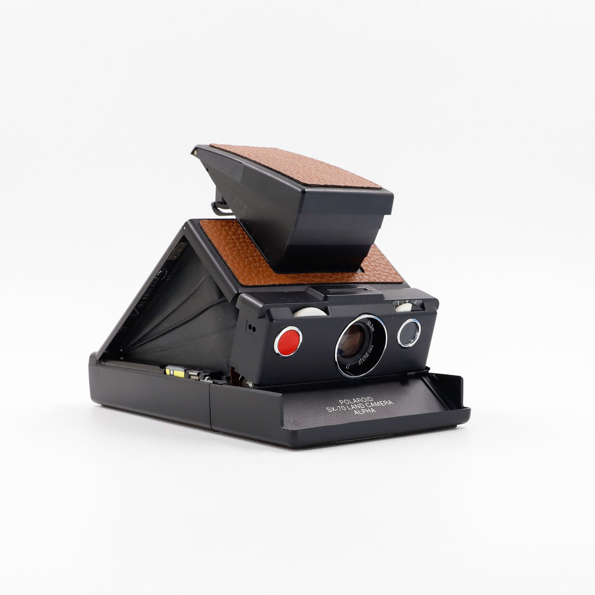 Polaroid SX-70 Alpha instant camera in black with restored caramel leather, converted to accept 600 film