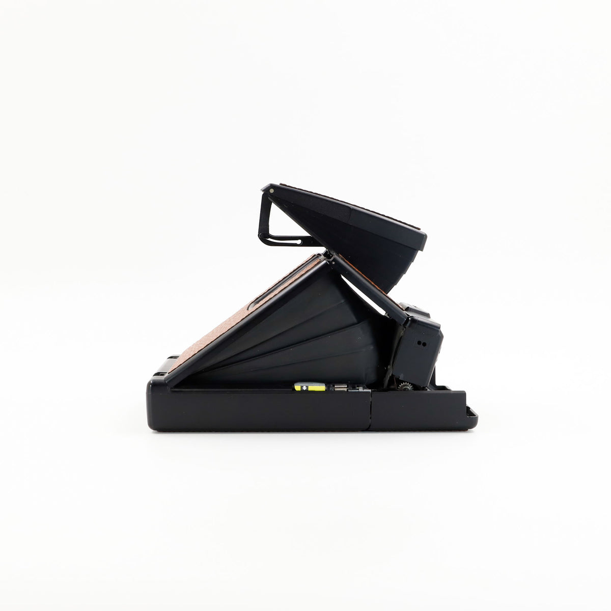Polaroid SX-70 Alpha instant camera in black with restored caramel leather, converted to accept 600 film