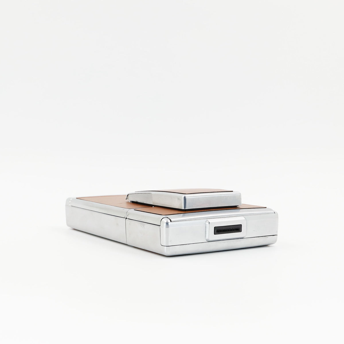 Polaroid SX-70 Land instant camera in silver with restored caramel leather, converted to accept 600 film