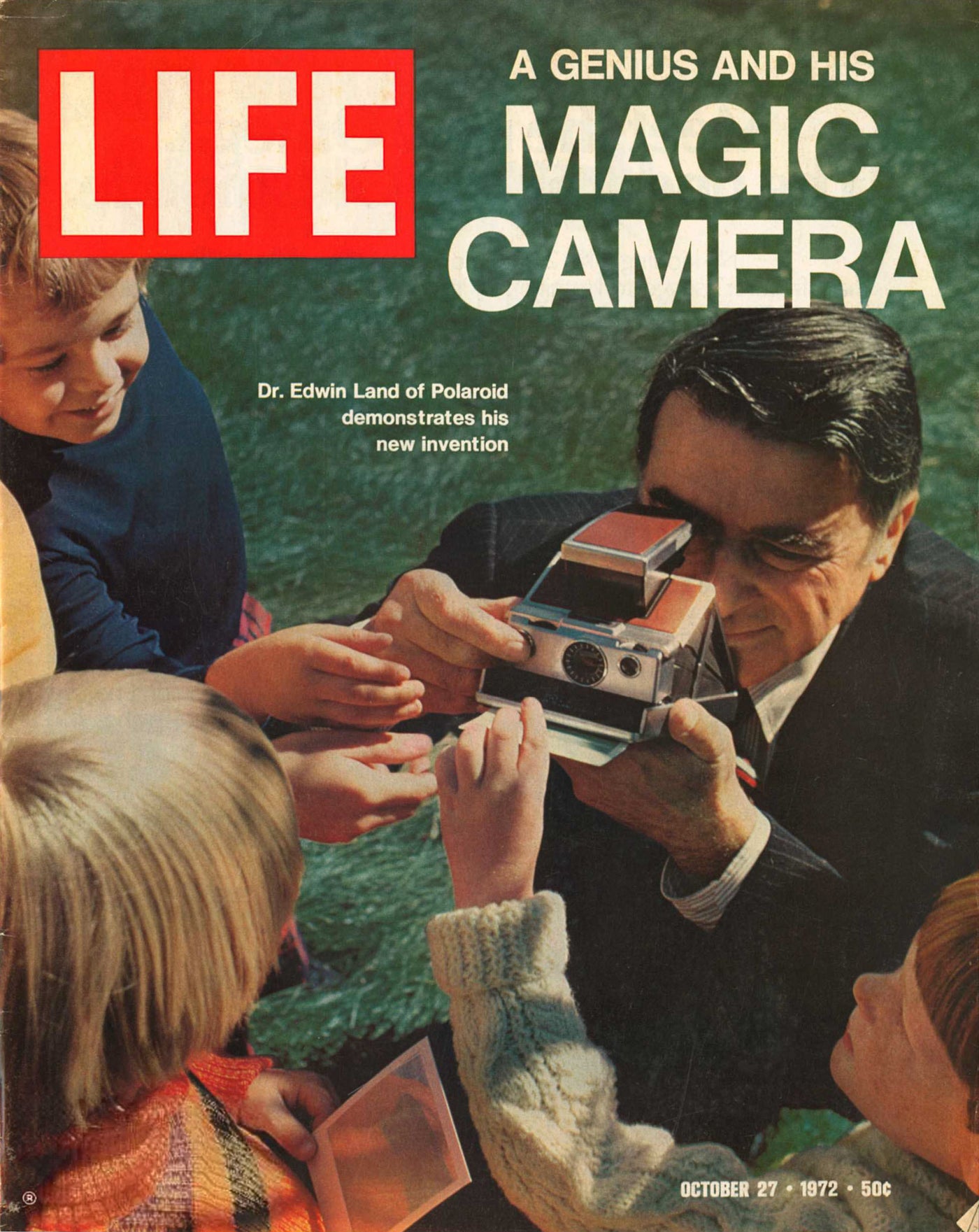 Vintage 'LIFE' magazine cover featuring Dr. Edwin Land with a Polaroid camera, surrounded by children.