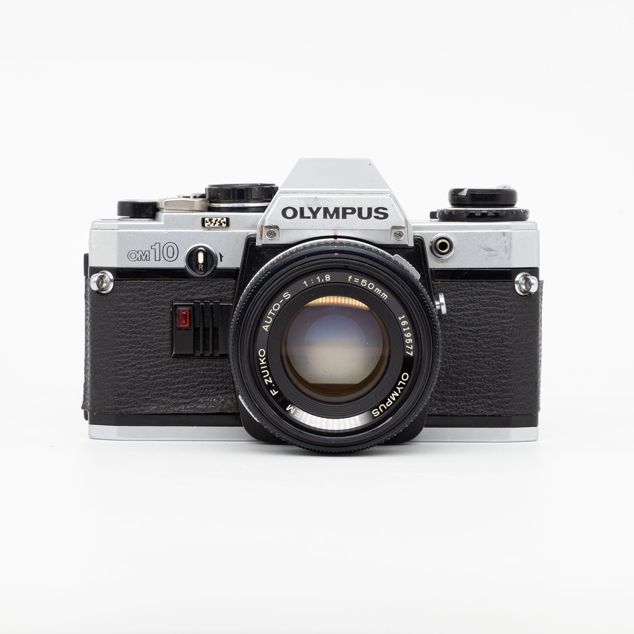 Fotocamera analogica Olympus OM10 con 50mm F1.8 Fotocamera analogica Olympus OM10 con 50mm F1.8