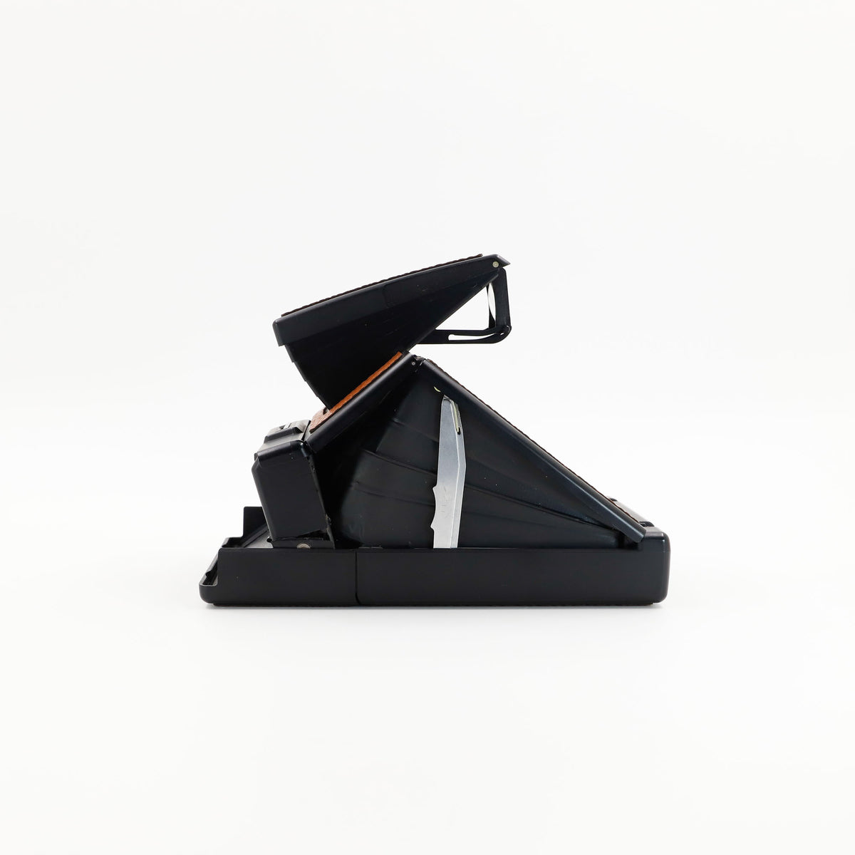 Polaroid SX-70 Alpha instant camera in black with restored caramel leather, converted to accept 600 film