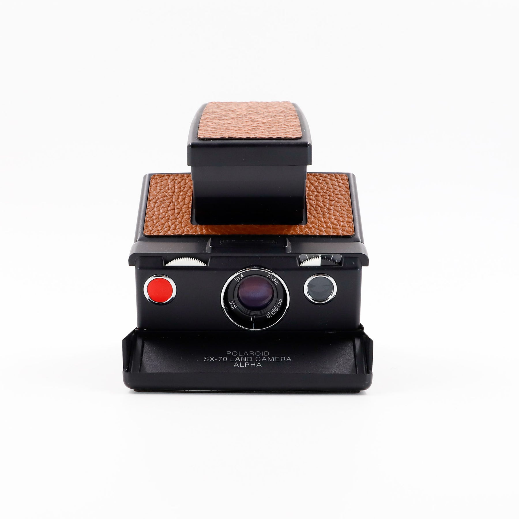 Polaroid SX-70 Alpha instant camera in black with restored caramel caramel leather, converted to accept 600 film