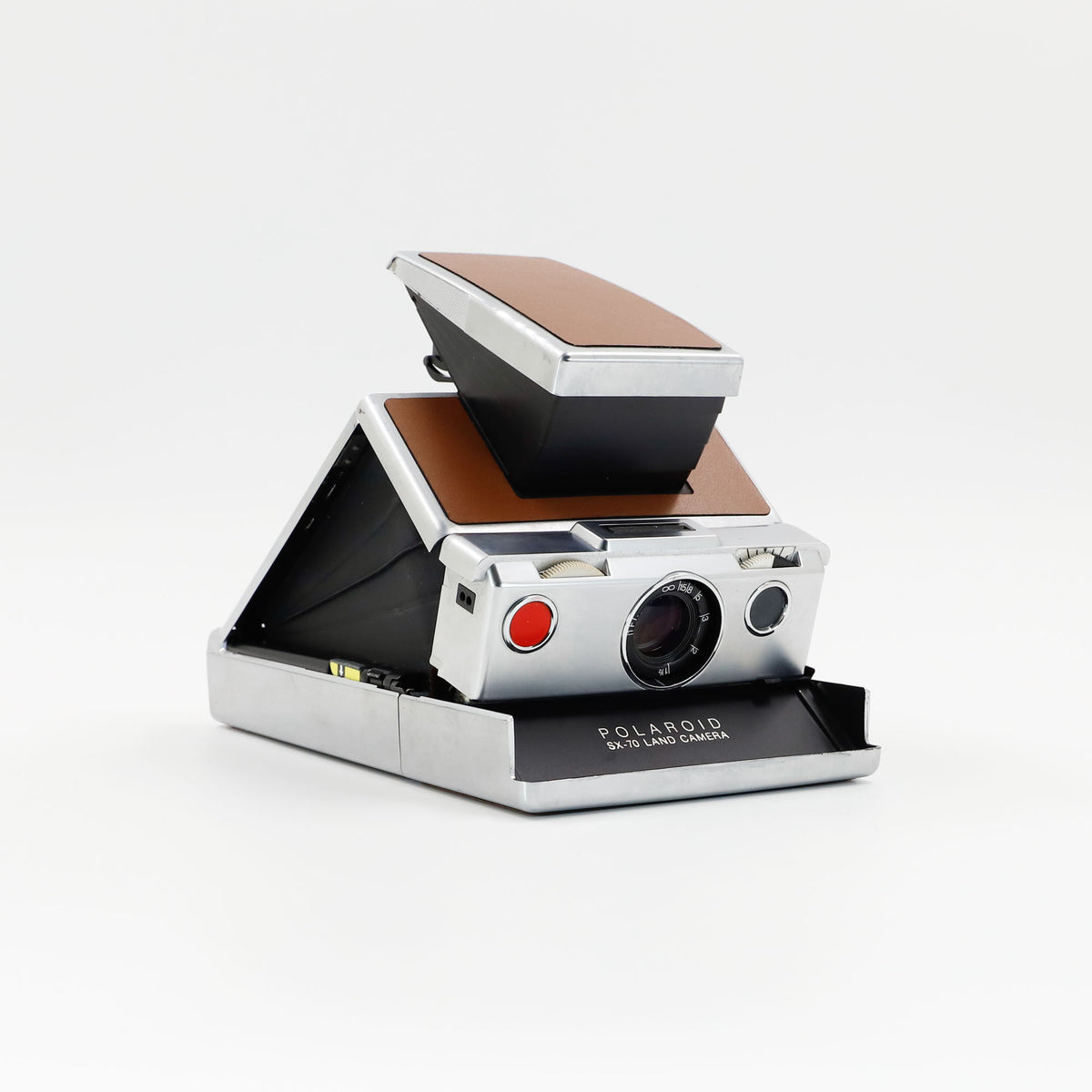 Polaroid SX-70 Land instant camera in silver with restored caramel leather, converted to accept 600 film