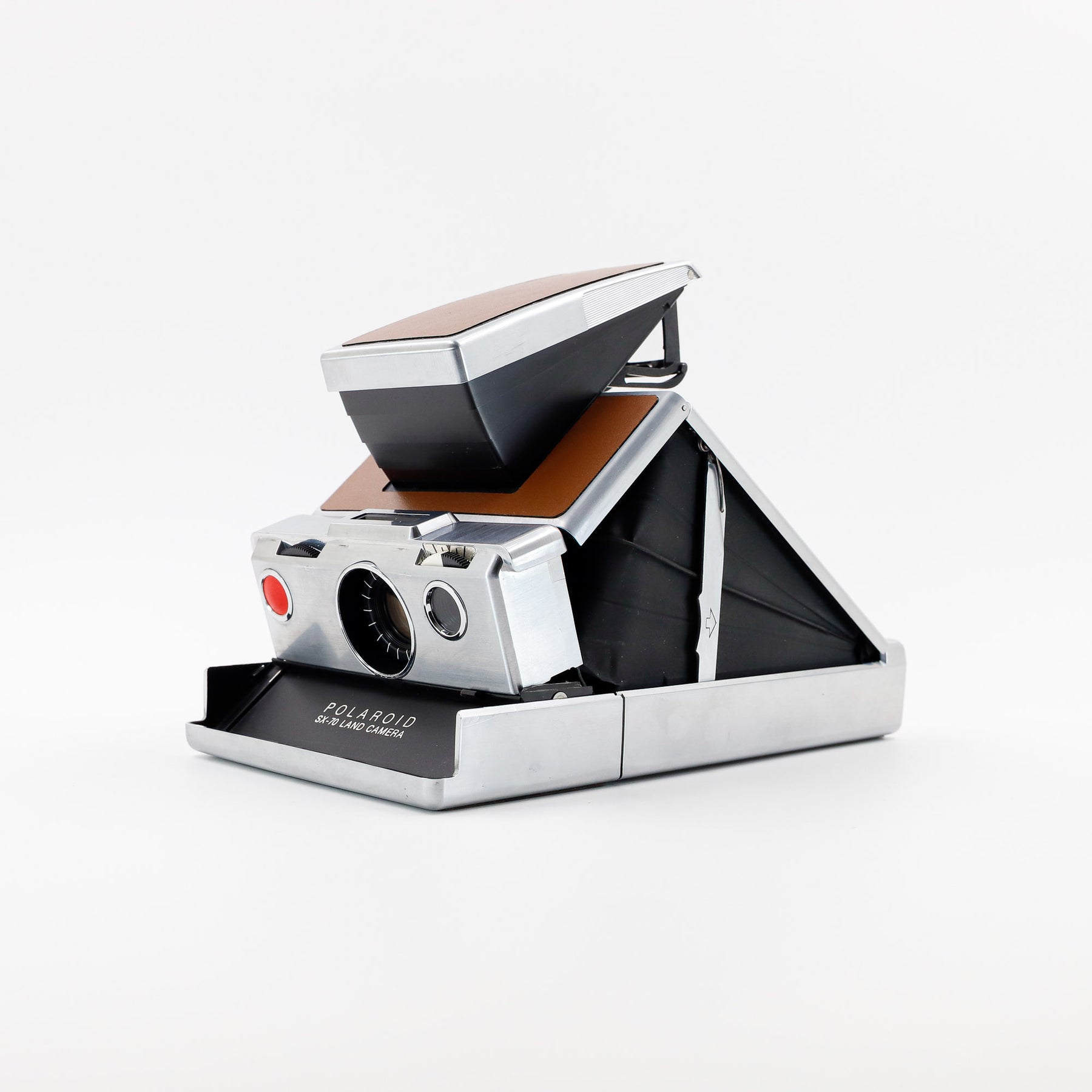 Polaroid SX-70 Land instant camera in silver with restored caramel leather, converted to accept 600 film