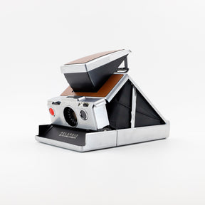 Polaroid SX-70 Land instant camera in silver with restored caramel leather, converted to accept 600 film