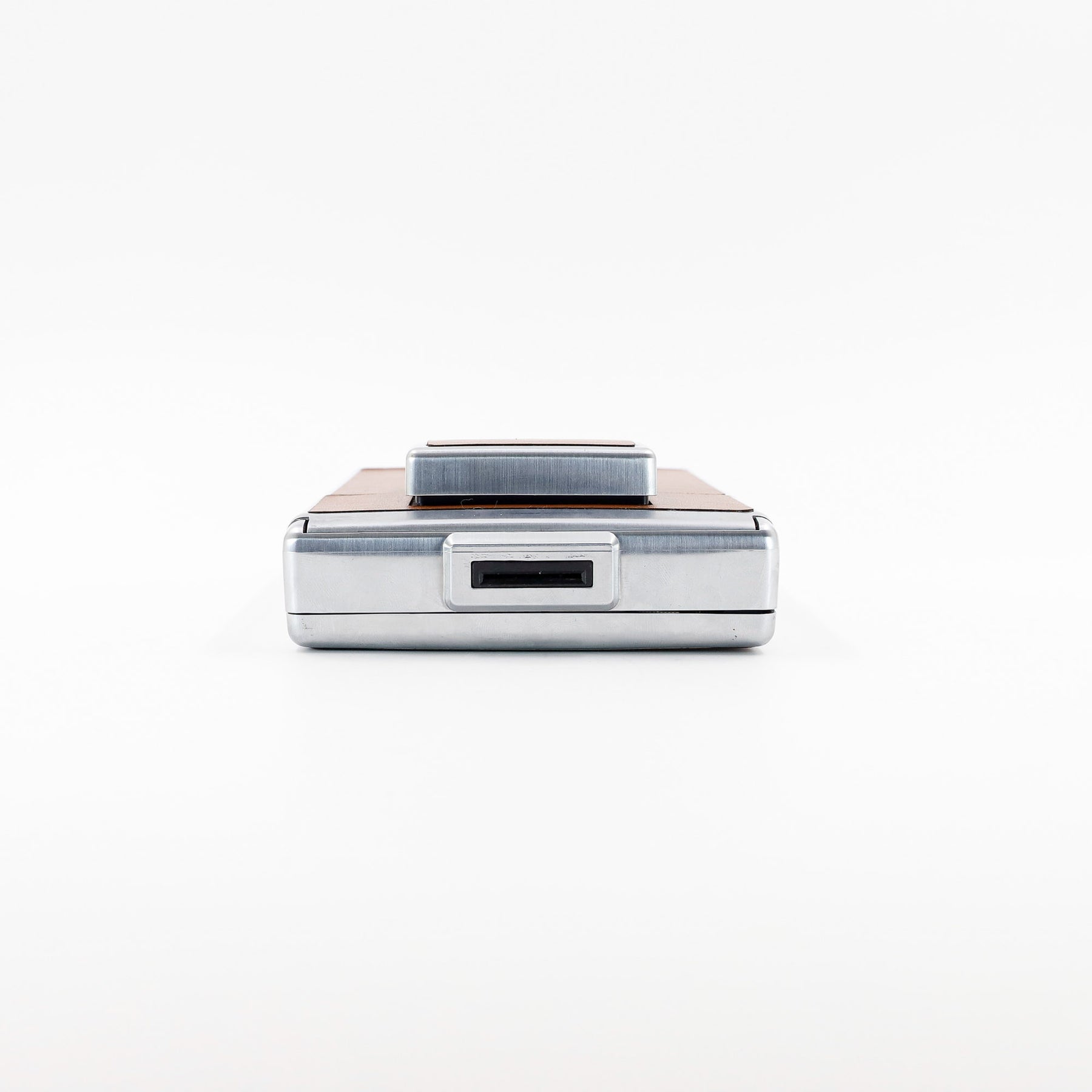 Polaroid SX-70 Land instant camera in silver with restored caramel leather, converted to accept 600 film