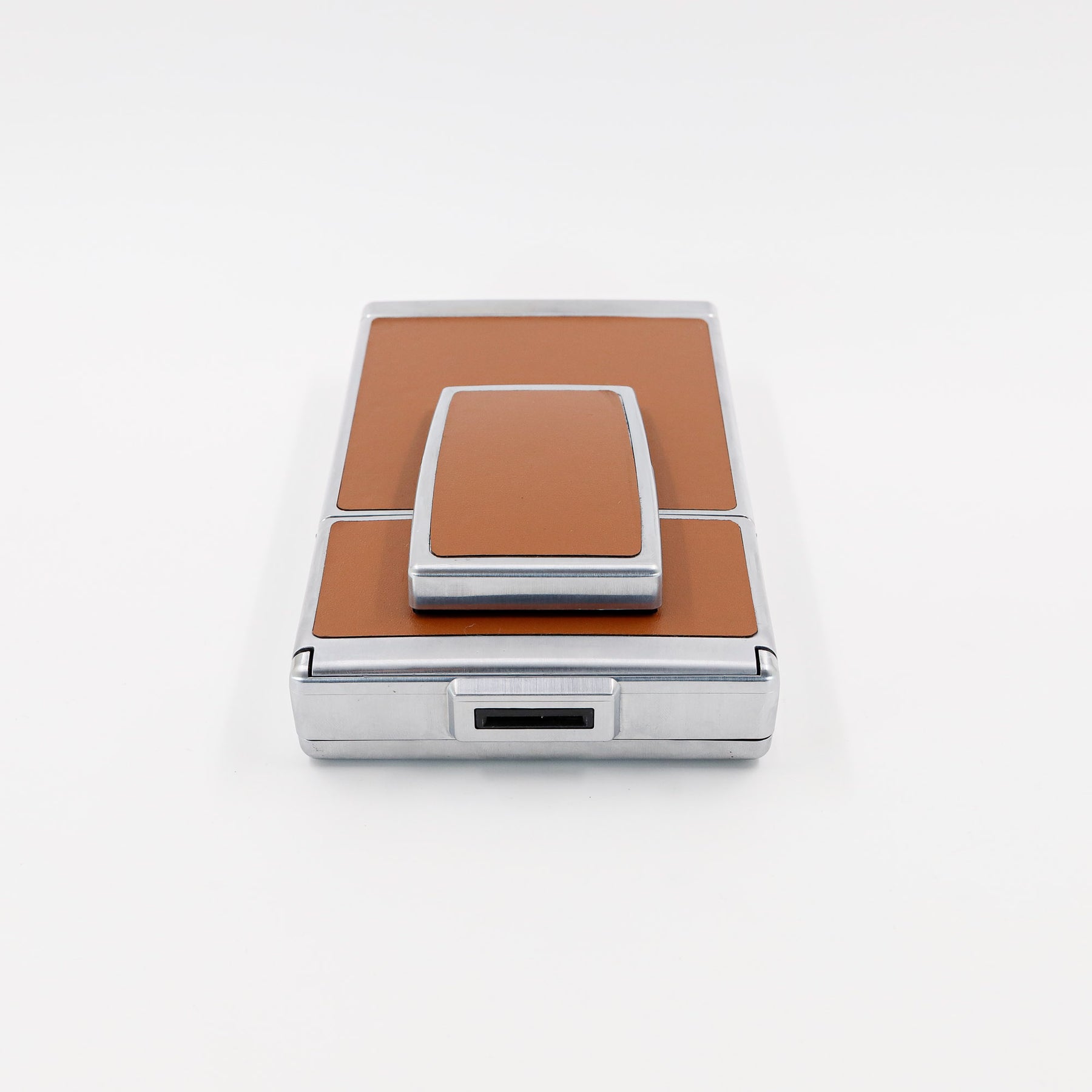 Polaroid SX-70 Land instant camera in silver with restored caramel leather, converted to accept 600 film