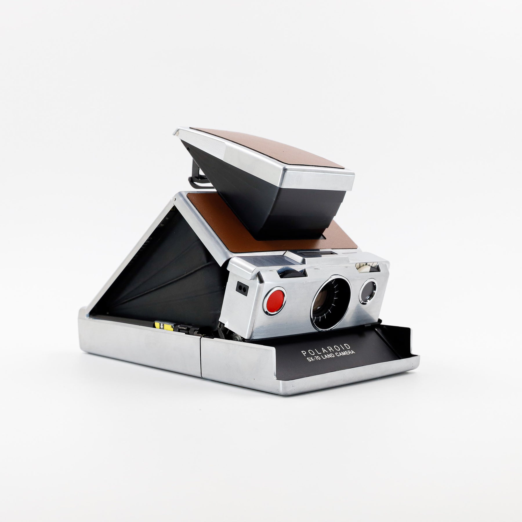 Polaroid SX-70 Land instant camera in silver with restored caramel leather, converted to accept 600 film