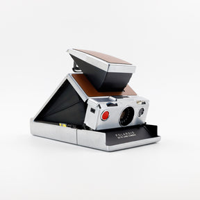 Polaroid SX-70 Land instant camera in silver with restored caramel leather, converted to accept 600 film