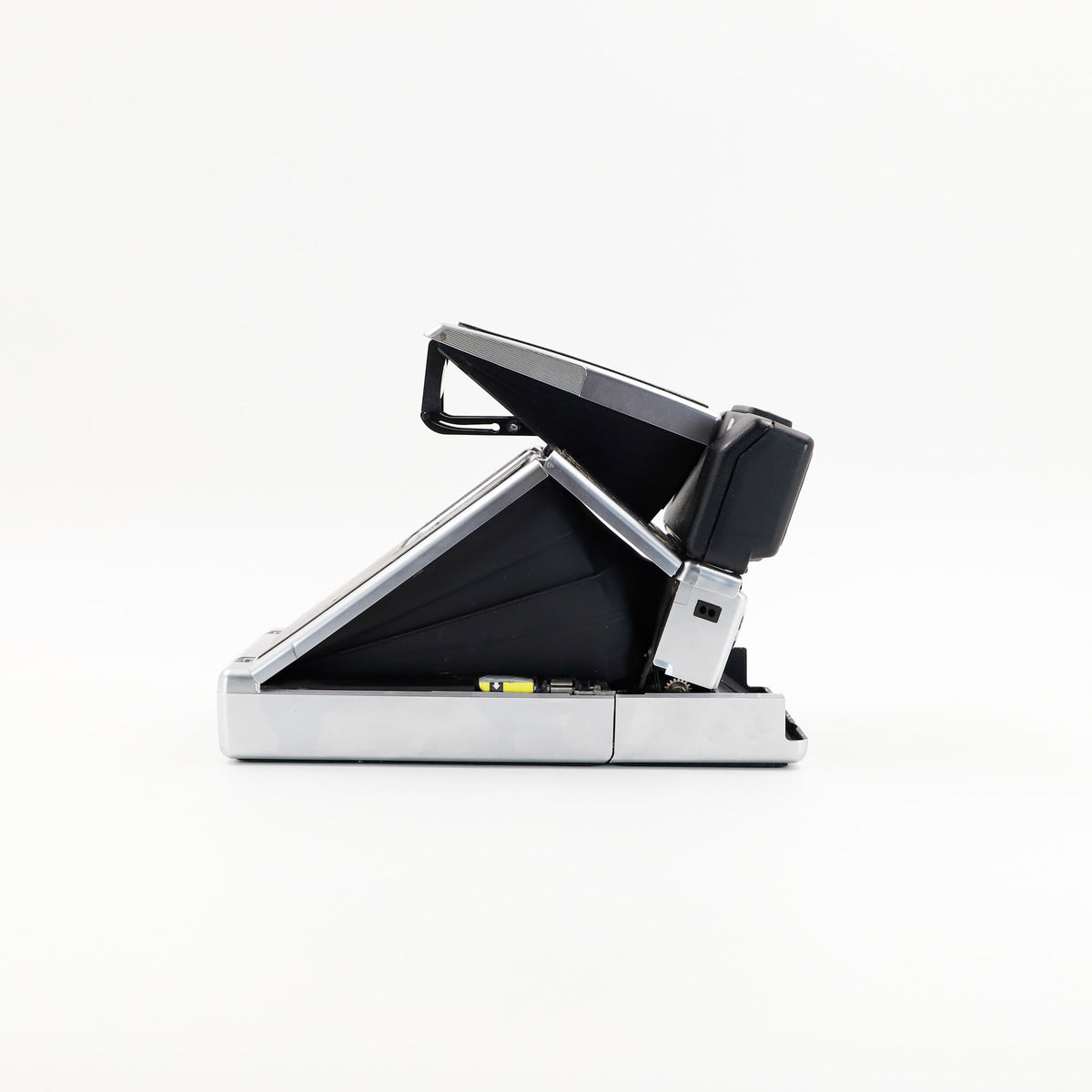 Polaroid SX-70 Land Sonar instant camera in silver with restored black leather, converted to accept 600 film