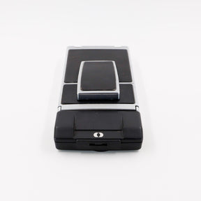Polaroid SX-70 Land Sonar instant camera in silver with original black leather, converted to accept 600 film